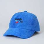 Blue cap with 'Sweet Child' text and cherries on a light gray background