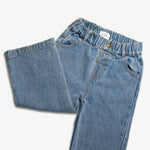Kids organic cotton denim jeans folded to show the leg and elasticated waist