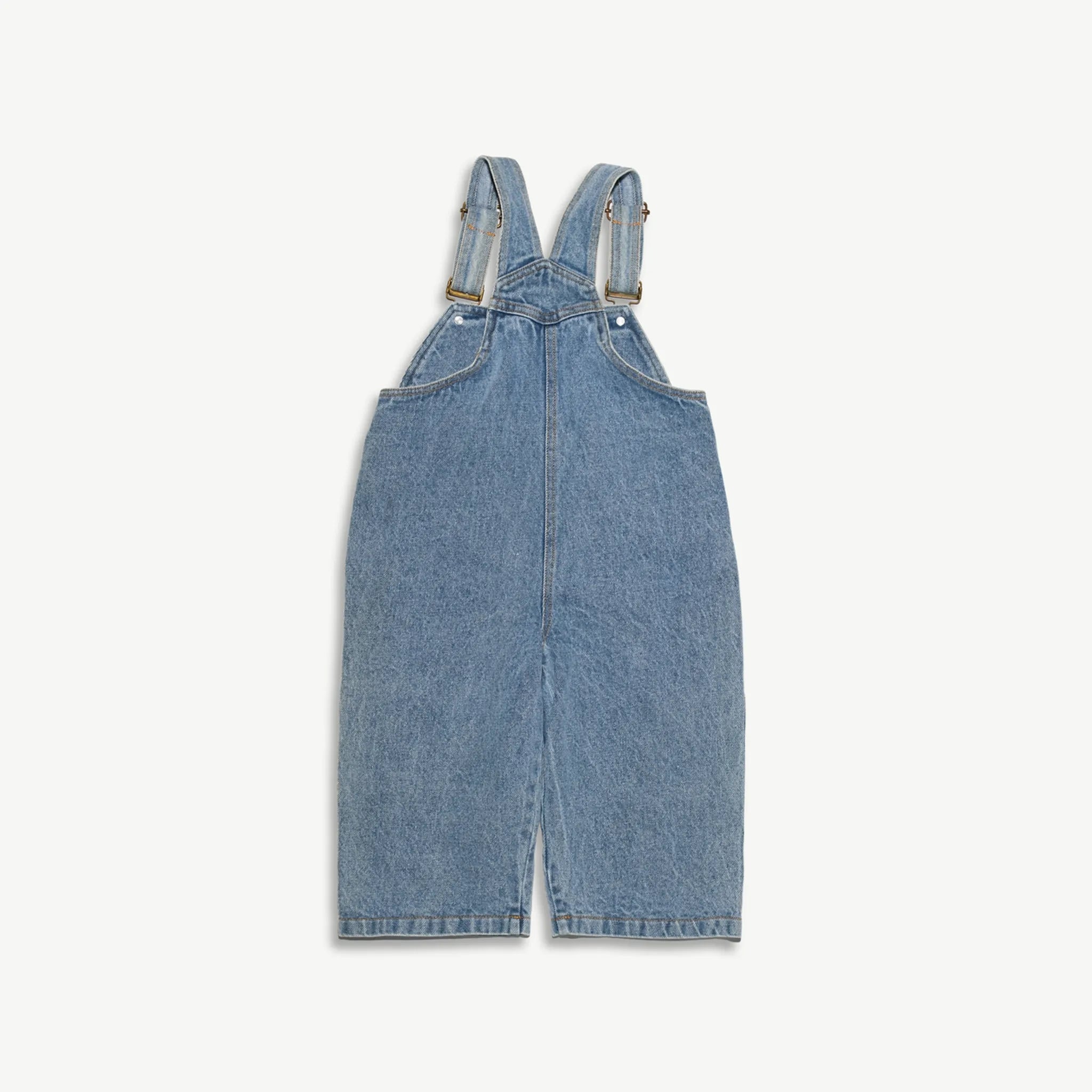 Back view of the kids organic cotton denim overalls with adjustable straps