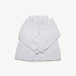 Kids organic cotton muslin blouse styled with the sleeves knotted