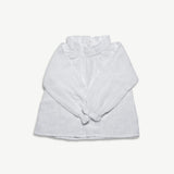 Kids organic cotton muslin blouse styled with the sleeves knotted