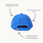 Blue cap with text highlighting features on a white background